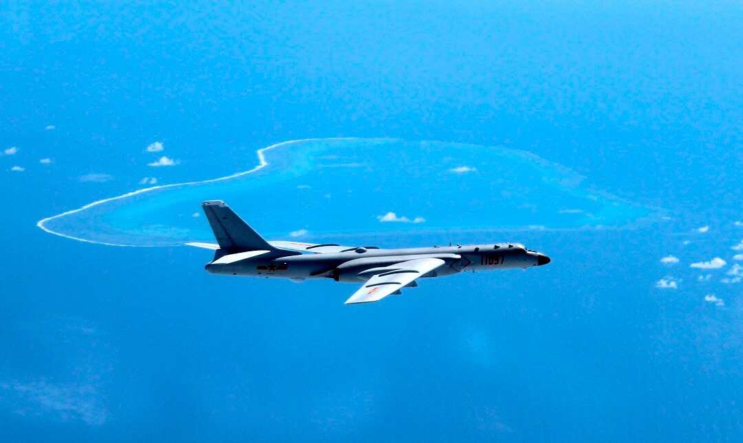 A Chinese H-6K bomber patrols the islands and reefs in the South China Sea. 
