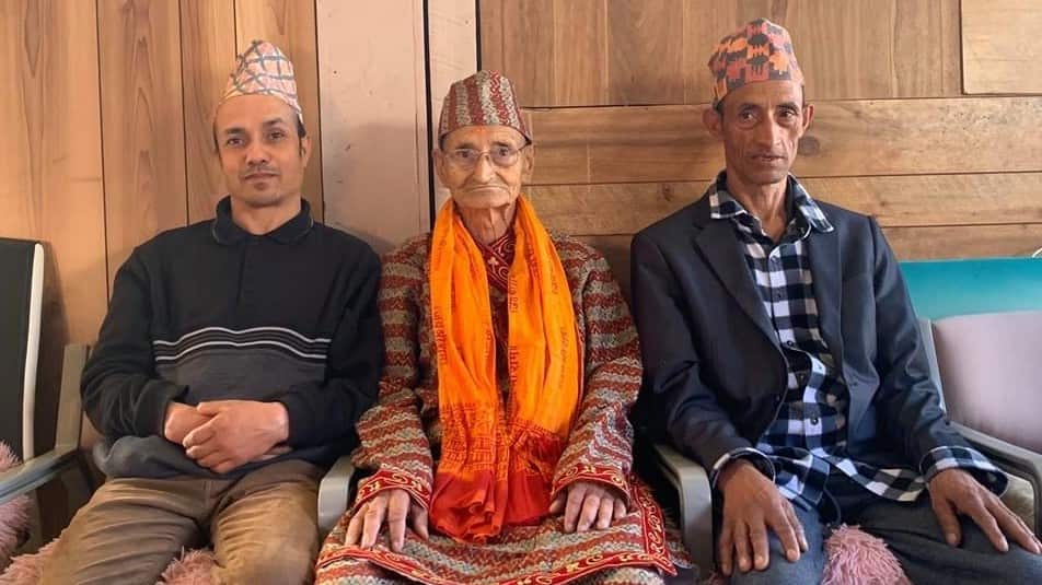 Late Chandra Bir Thapa (centre) with his sons.