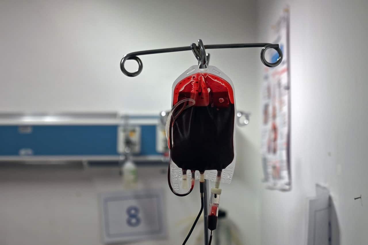 A cancer patient receives a blood transfusion