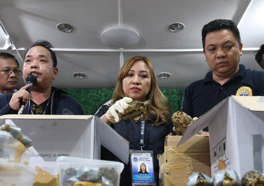 Customs Collector Chief Carmelita Talusan with her colleagues (AAP)