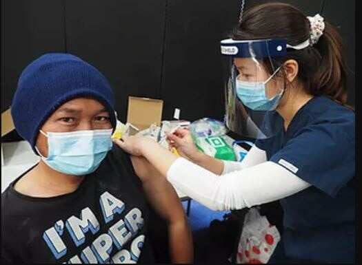 Utopia nurse Juliette Moe vaccinating a client.