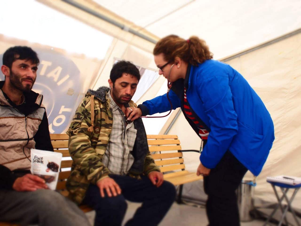 Helen Zahos treating people at the border during the Greek refugee crisis. 