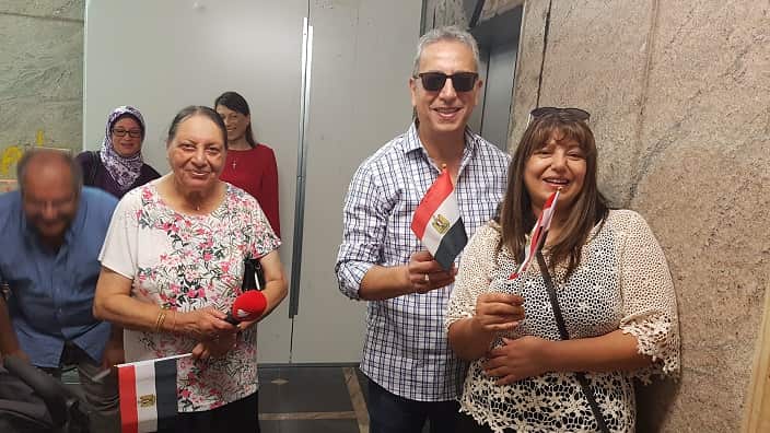 George Hanna with other voters