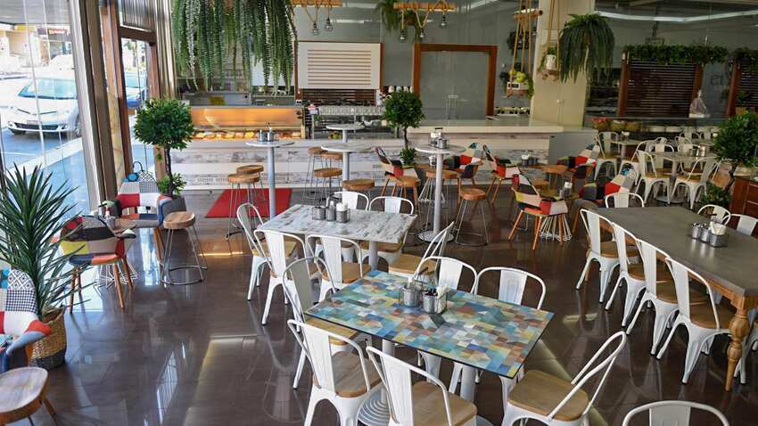 El Sweetie shop with all chairs empty due to Coronavirus restrictions 