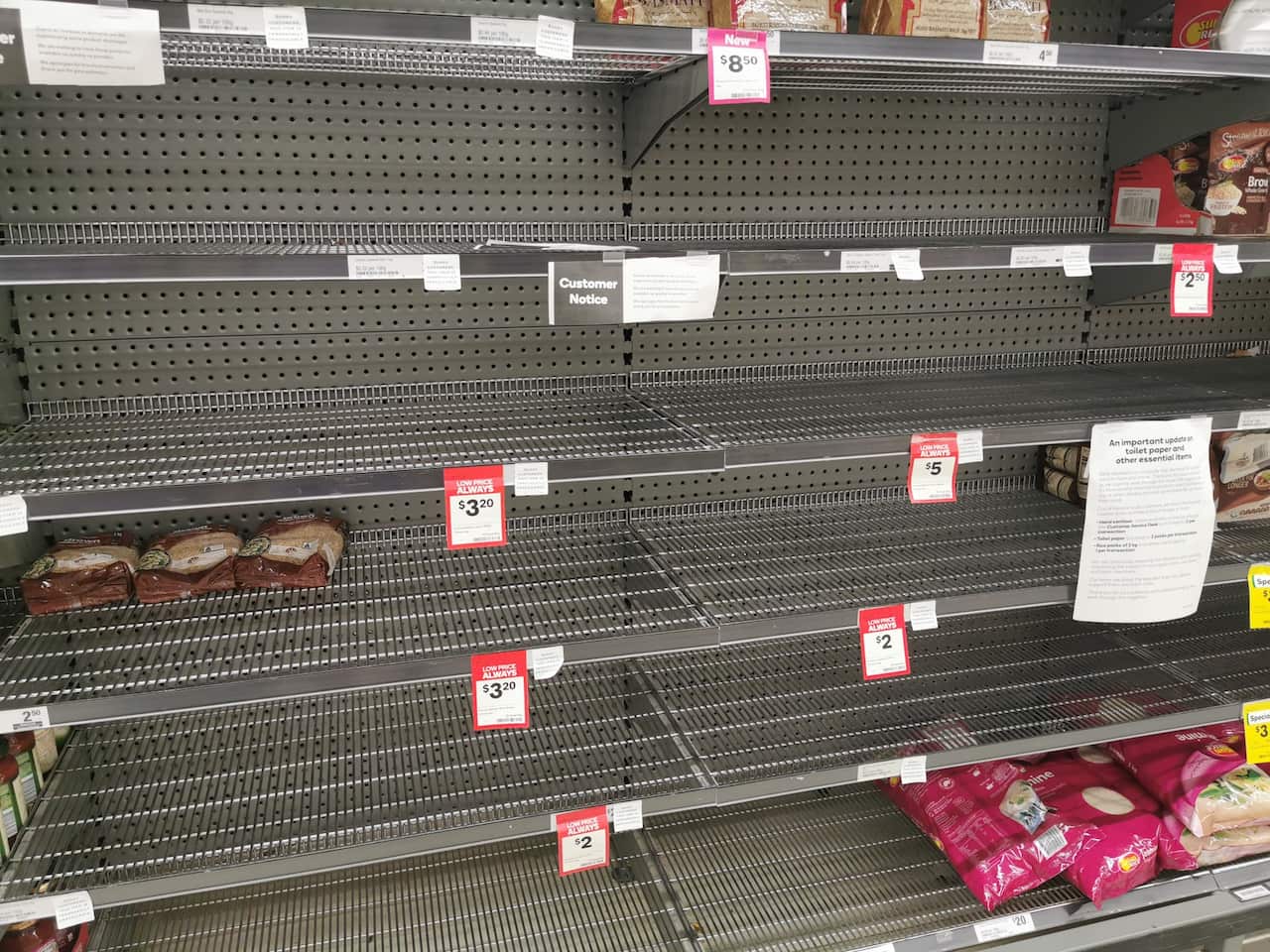 A view of Empty rice and food aisles shelves at a supermarket in Brisbane..Australian shops experiences shortage on some products such a rice, canned food, toilet paper and hand sanitizer. (Photo by Florent Rols / SOPA Images/Sipa USA)