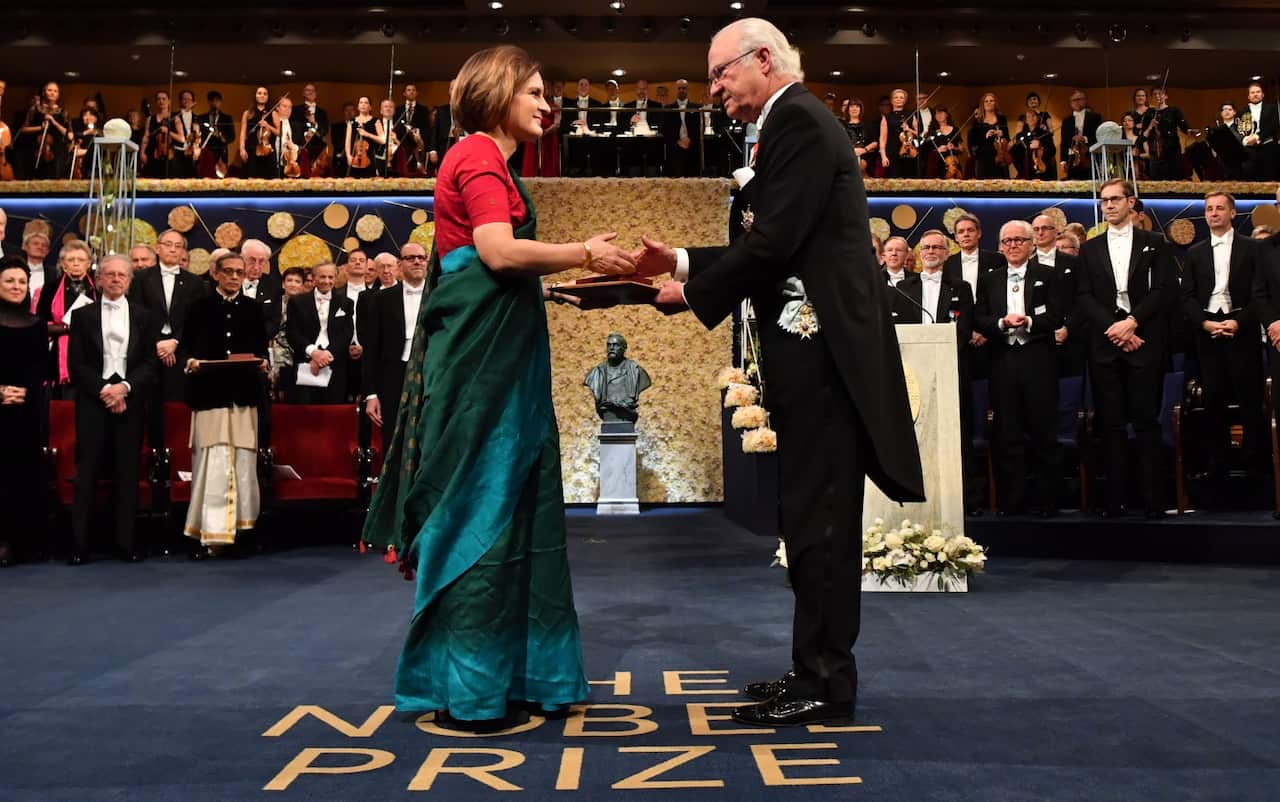 Esther Duflo and Prince Carl Philip during the Nobel Prize Awards Ceremony at Concert Hall on December 10, 2019 in Stockholm, Sweden. 