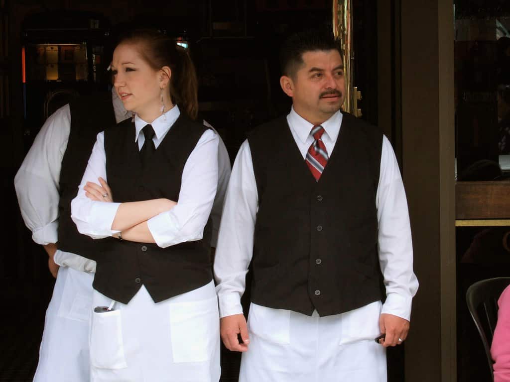 Waiters - hospitality workers.