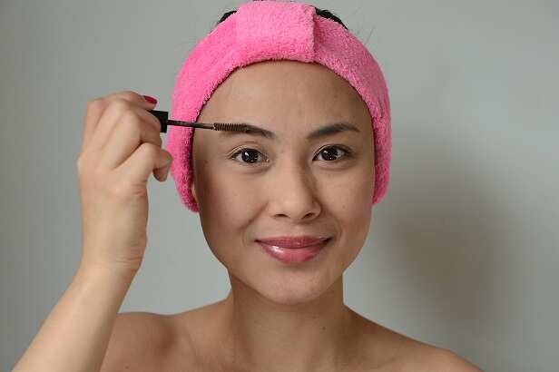 comb through brows with gel