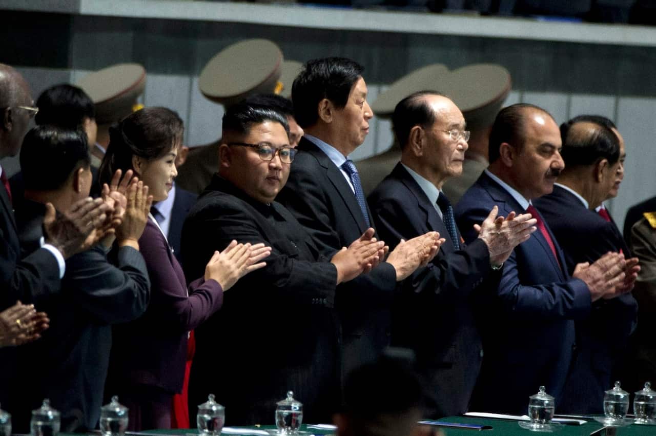 North Korean leader Kim Jong Un arrives for the "Glorious Country" mass games held in conjunction with the 70th anniversary of North Korea's