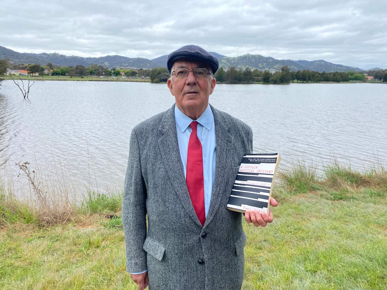 Tony Kevin with his book A Certain Maritime Incident.