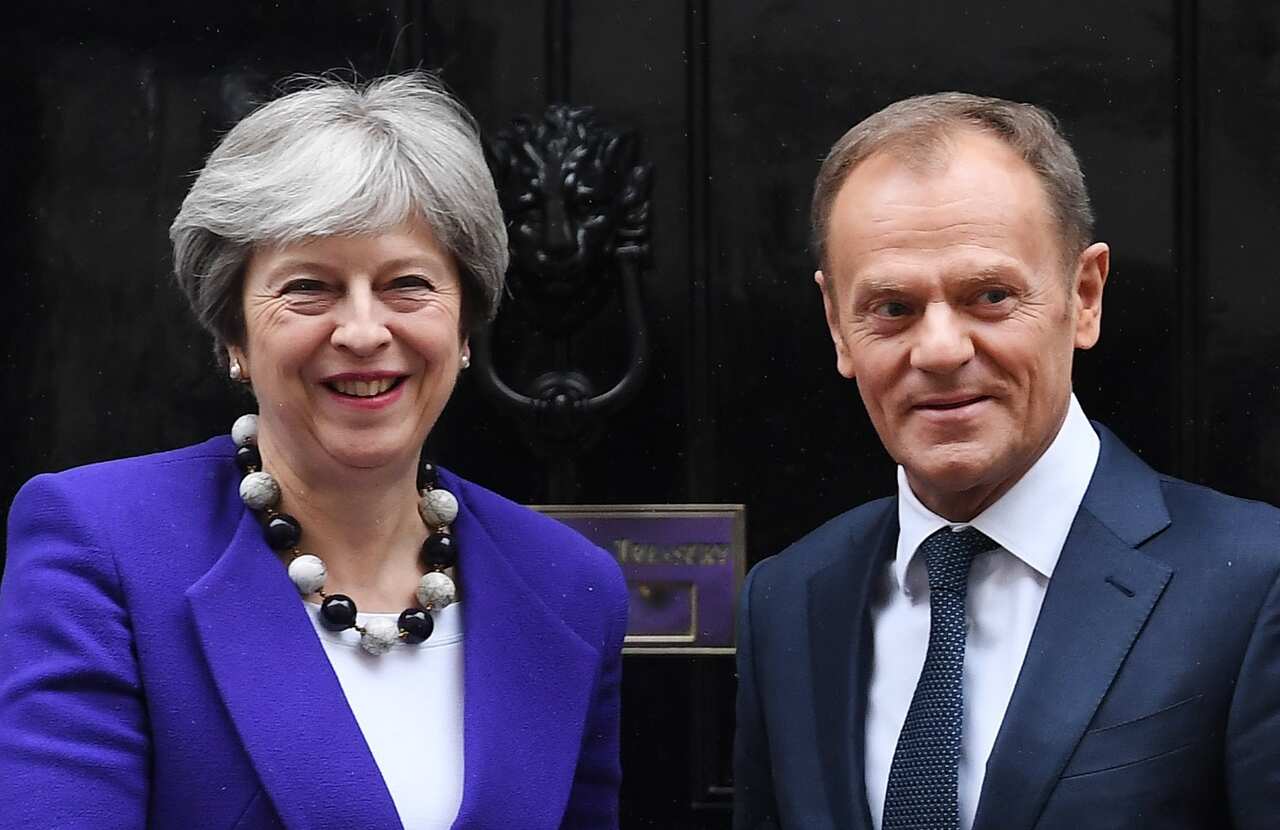 Britain's Prime Minister Theresa May greets EU Council President Donald Tusk at 10 Downing Street on March 1