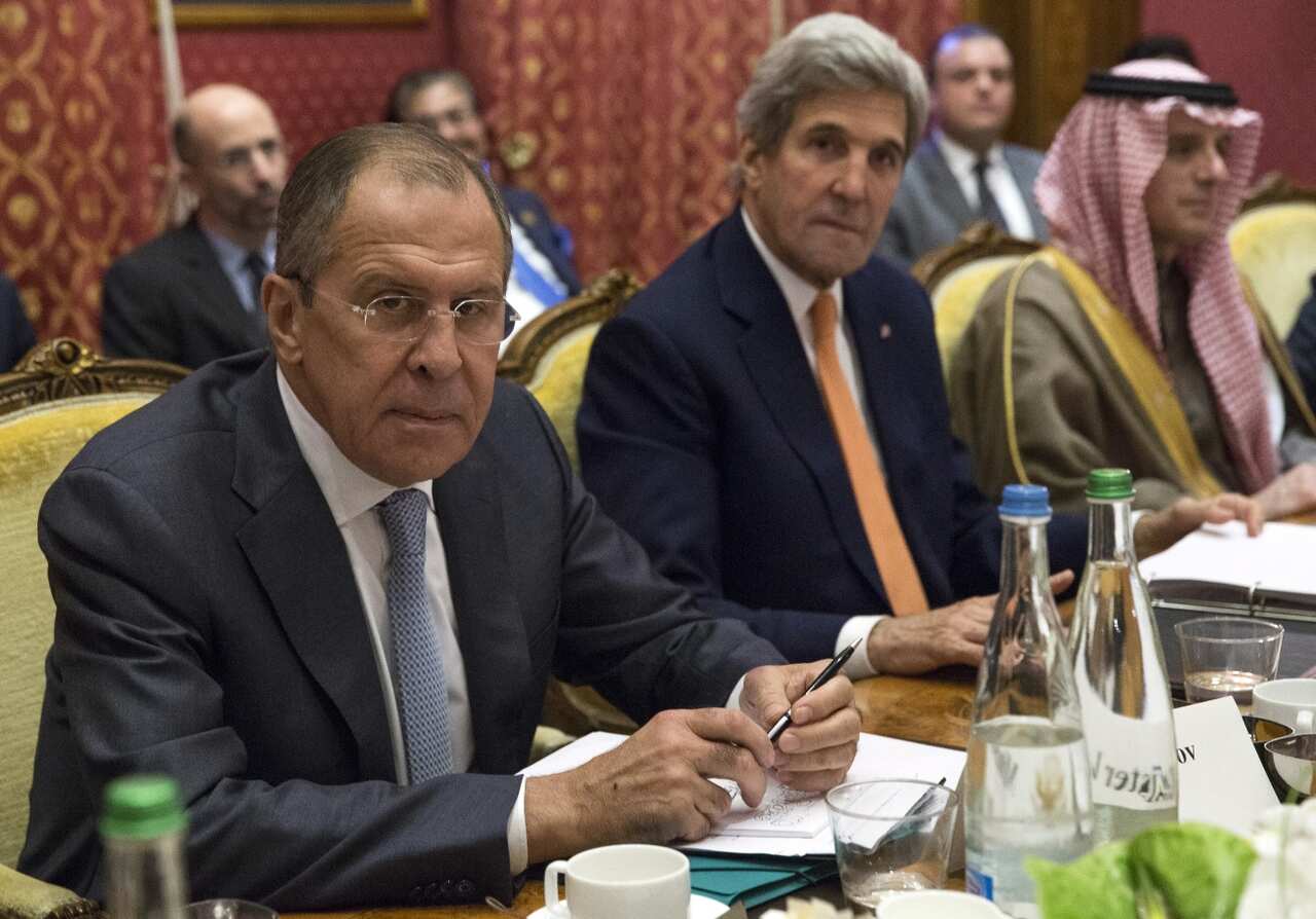  Russia's Foreign Minister Sergei Lavrov, US Secretary of State John Kerry and Saudi Arabia's Foreign Minister Adel al-Jubeir 