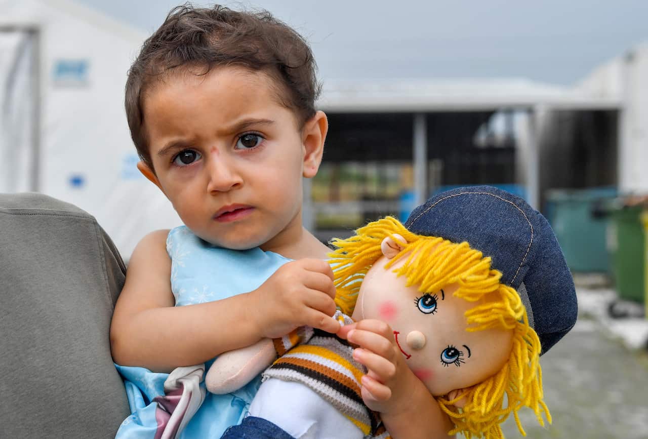 A two-year old Syrian refugee girl at the border between North Macedonia and Greece, near the southern city of Gevgelija, Republic of North Macedonia.