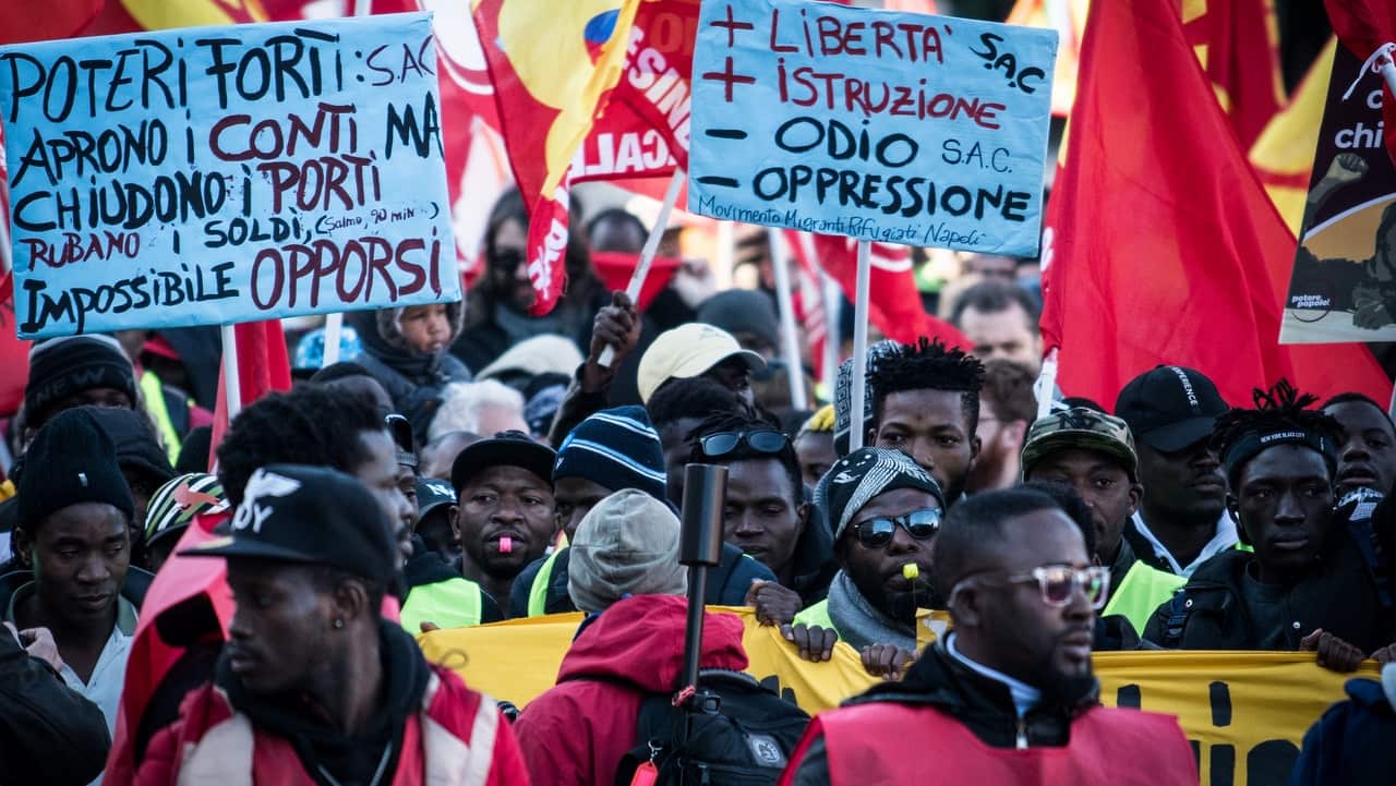 People demonstrate in Rome against the so-called Salvini decree on 15 December, 2018.