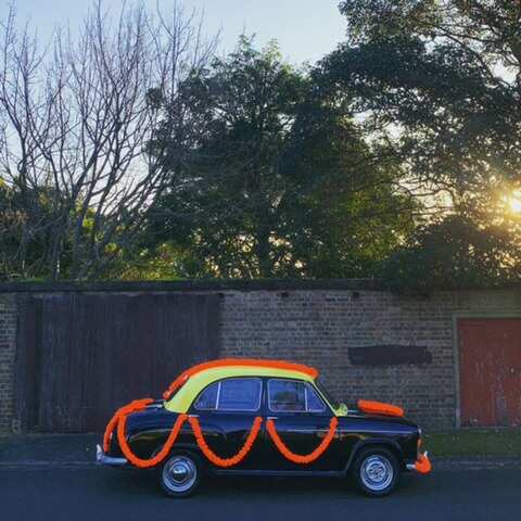 People use 'Bollywood Car', a black and yellow taxi cab in Sydney for various purposes.