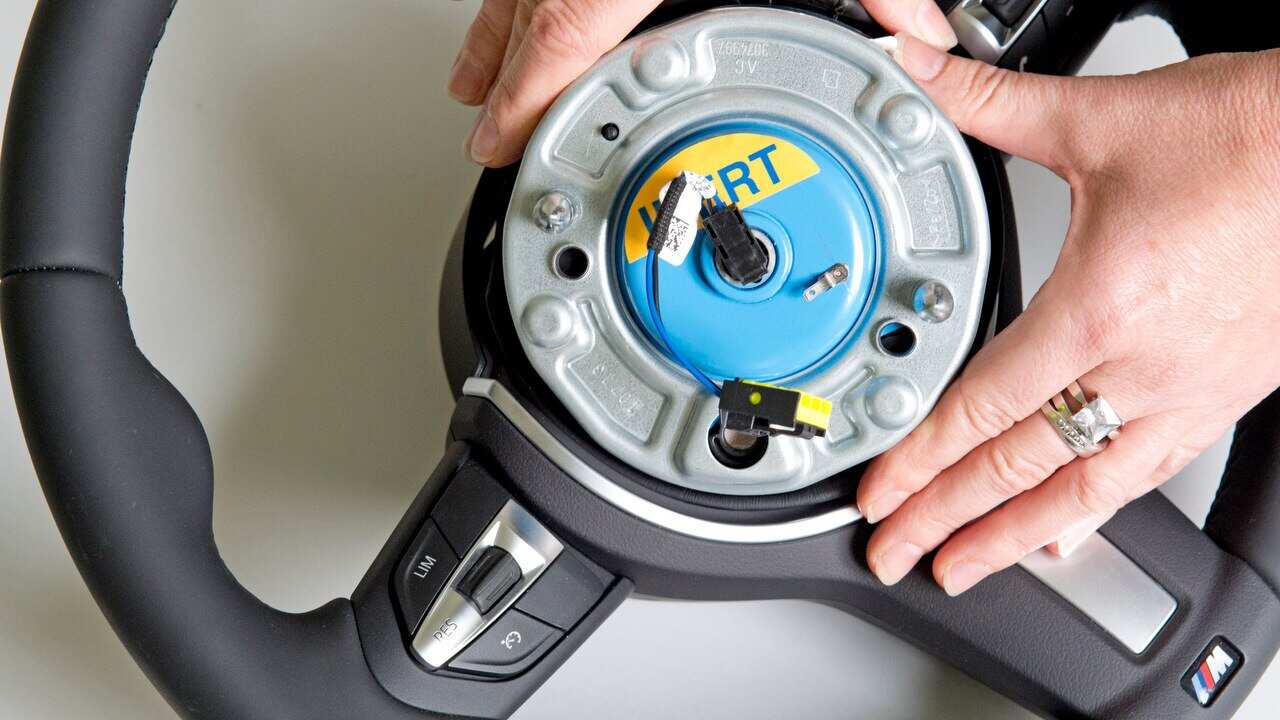 A pyro-electric wheel airbag initiator.