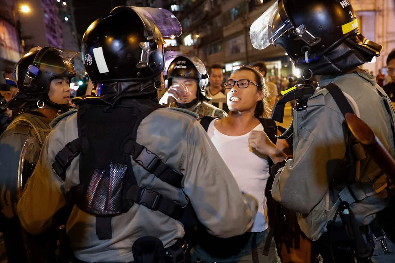 Hong Kong police are resorting to harsher tactics as they struggle to control the mass protests.