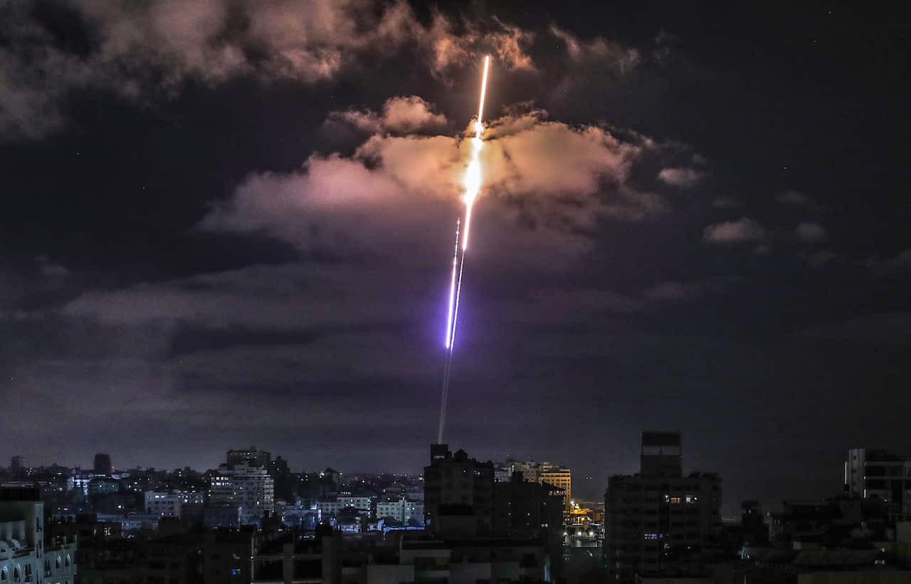A rocket fired from Gaza flies towards Israel, in Gaza City, 17 May 2021.
