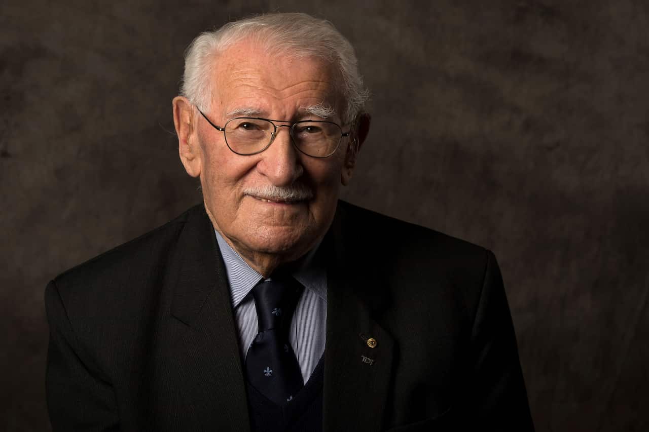 In this undated photo provided by the Sydney Jewish Museum, Holocaust survivor Eddie Jaku poses for a photograph in Sydney, Australia.