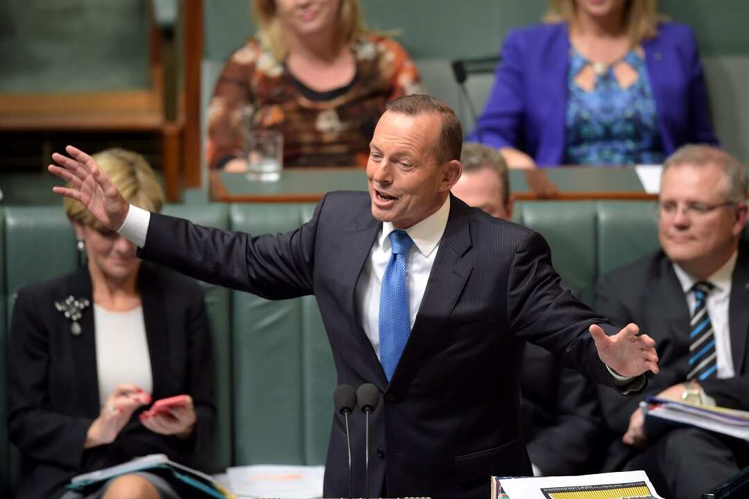 Australian Prime Minister Tony Abbott speaks during House of Representatives Question Time at Parliament House in Canberra, Monday, Sept. 14, 2015. (AAP Image/Lukas Coch) NO ARCHIVING