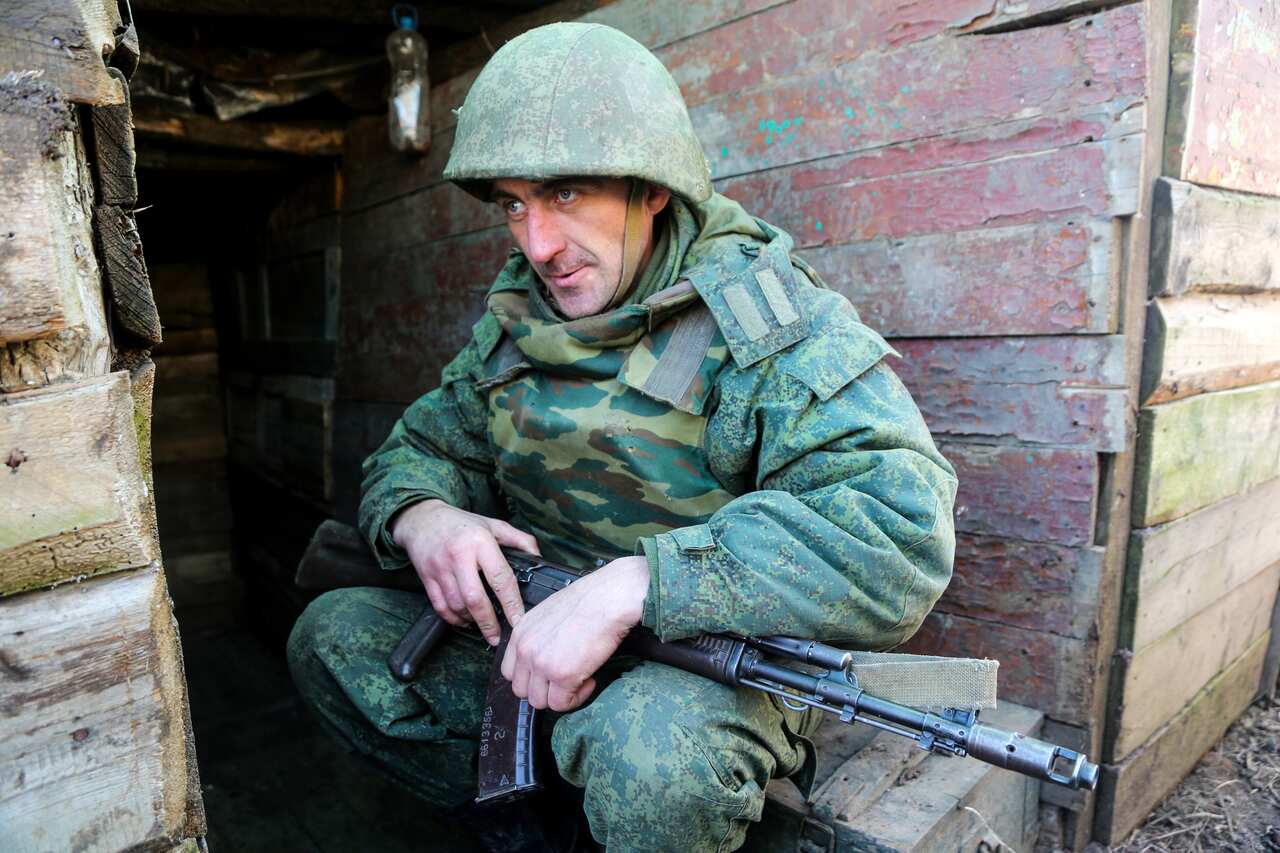 DONETSK REGION, UKRAINE  FEBRUARY 15, 2022: A serviceman of the Donetsk People's Militia stationed on the front line near the rural town of Staromikhailovka, west of Donetsk. Valentin Sprinchak/TASS/Sipa USA