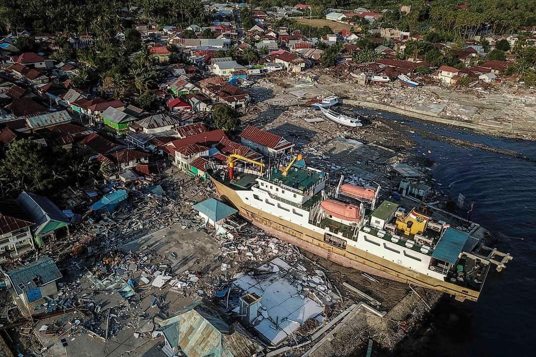 Drone camera footage shows a ship stranded on the shore after tsunami hit the area in Wani, Donggala.