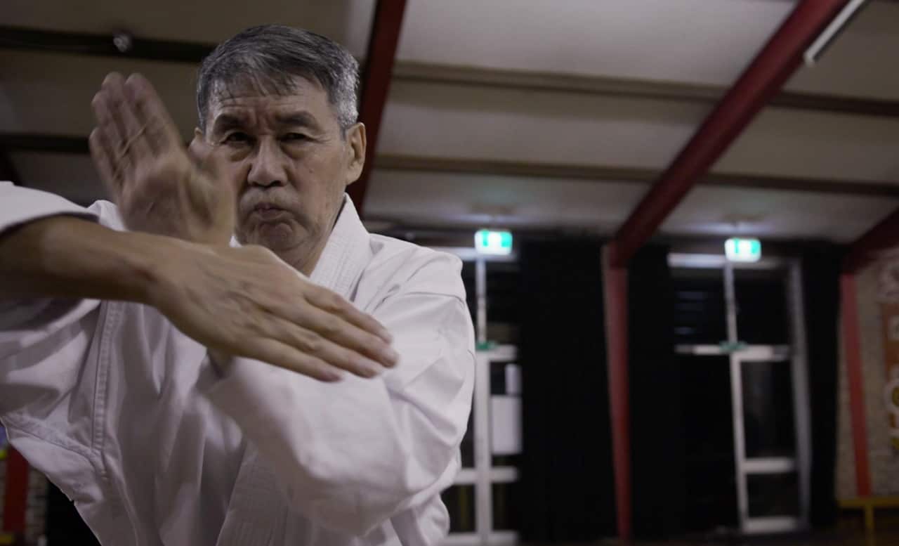 Phillip Chin Quan doing karate move 