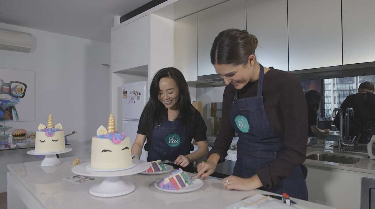 reporter, Sarah Abo and Bake It Box Founder, Emily Chen taste their creations.
