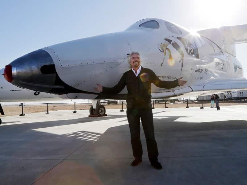 British entrepreneur Richard Branson poses with SpaceShipTwo