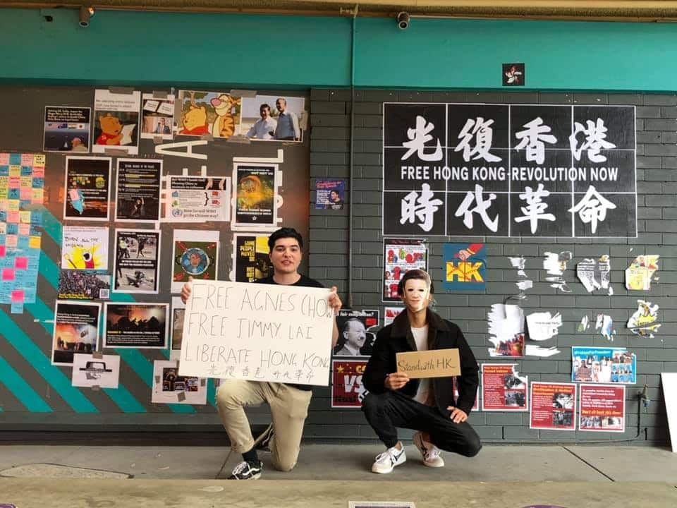 Human rights activist Drew Pavlou (left).