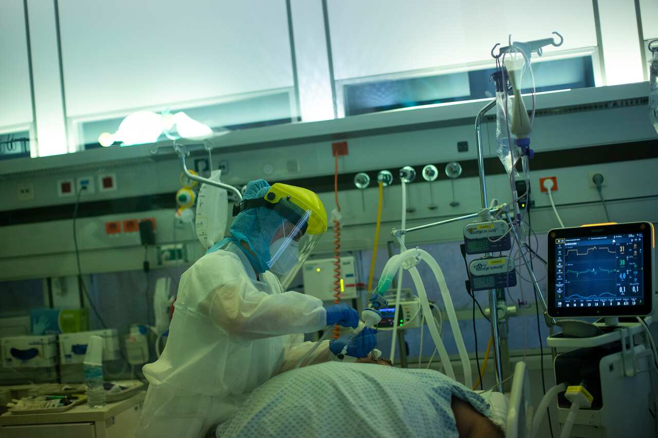 A member of the medical staff works in the intensive care ward for COVID-19 patients at the CHR Citadelle hospital in Liege, Belgium.