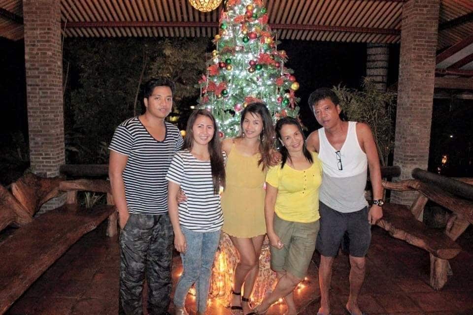 Blessa with her family in the Philippines