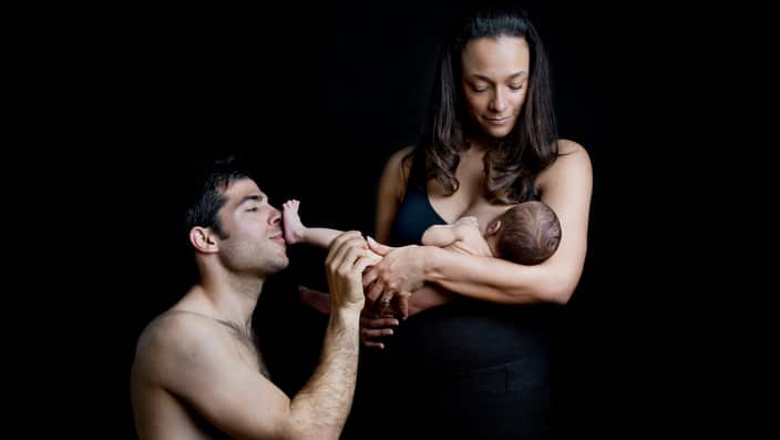 Family with baby in studio