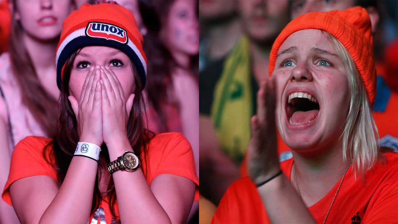 Dutch and Australian soccer fans gather at Sydney's Home Bar to watch the 2014 World Cup match between Australia and the Netherlands in Brazil
