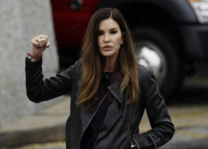Model Janice Dickinson gestures outside the Montgomery County Courthouse during Bill Cosby's sentencing hearing.