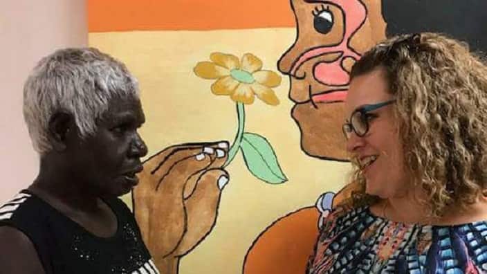 Helen Zahos with an Indigenous woman in Ramingining, Northern Territory.