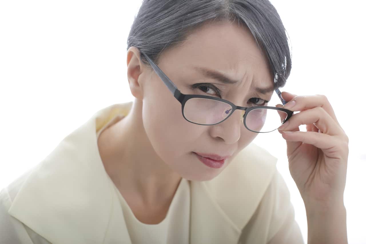 middle aged woman with a frowning face