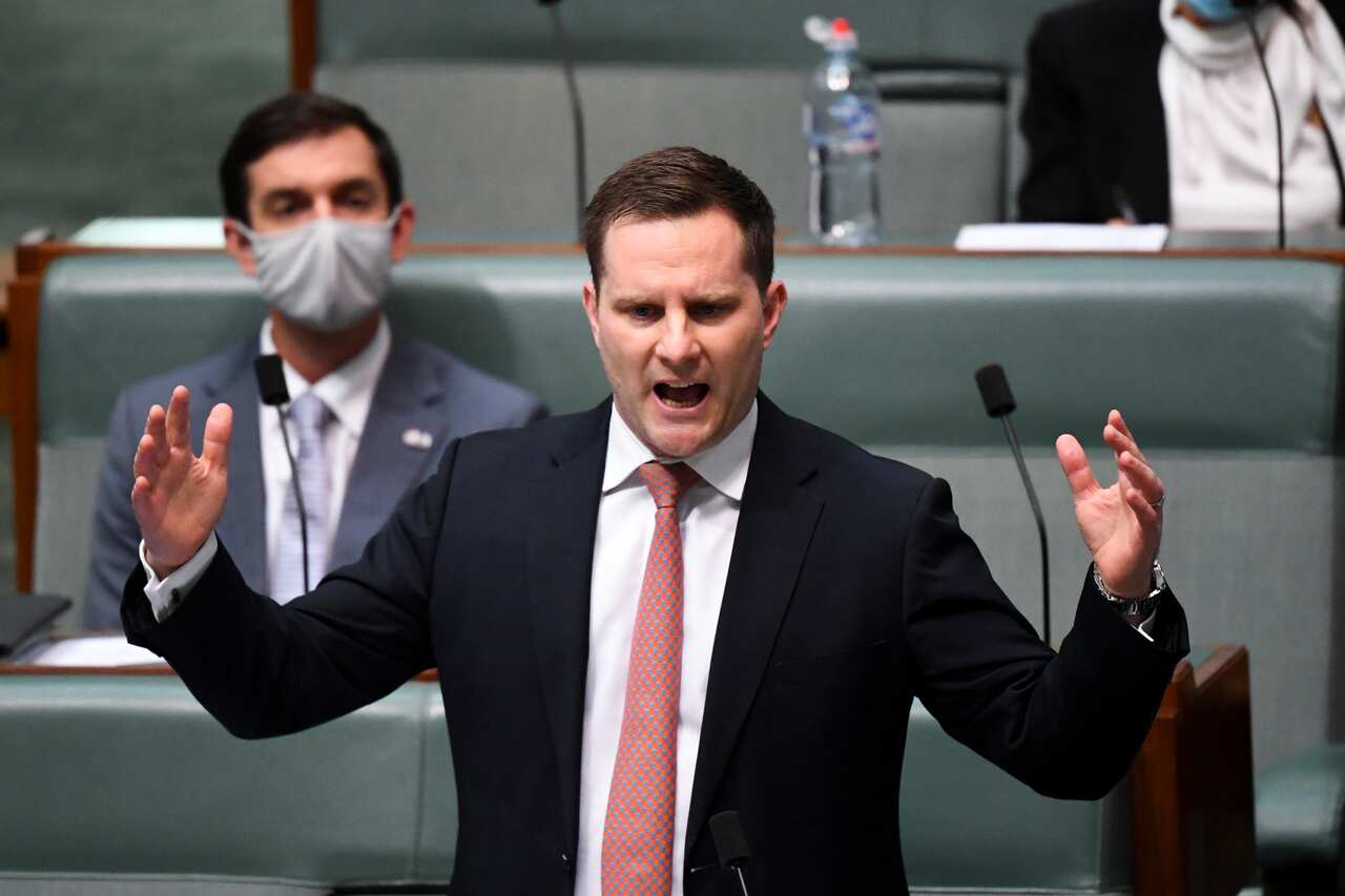 Immigration Minister Alex Hawke speaks during Question Time at Parliament House in Canberra.