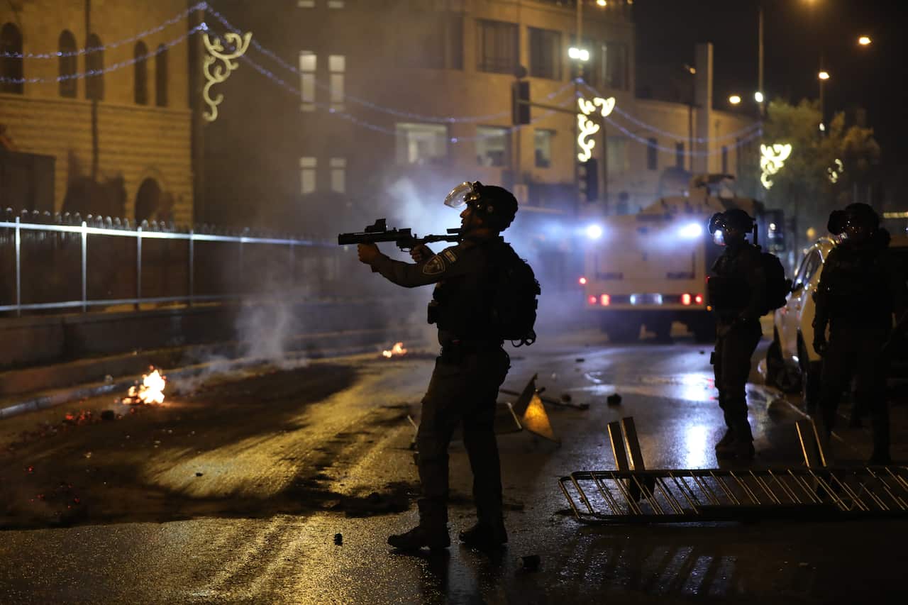 Israeli police fires grenades during a protest in Damascus Gate  in Jerusalem, 8 May 2021. 