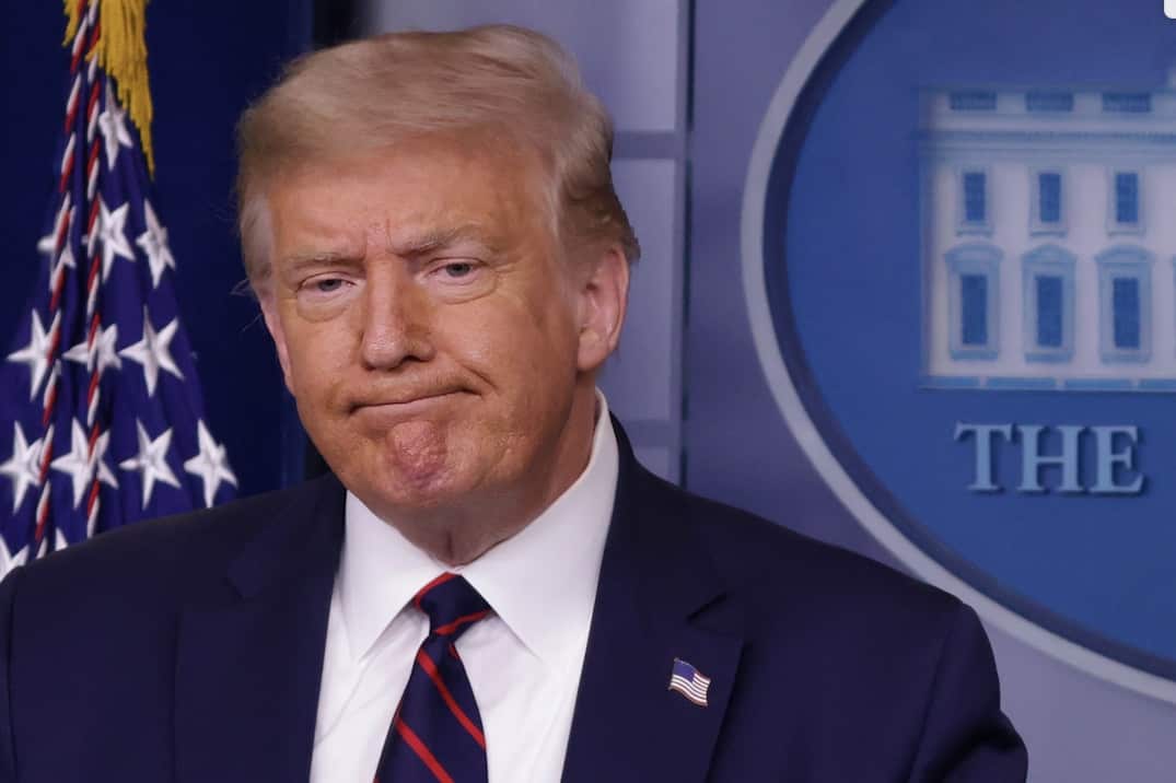 Donald Trump talks to the media in the White House. 