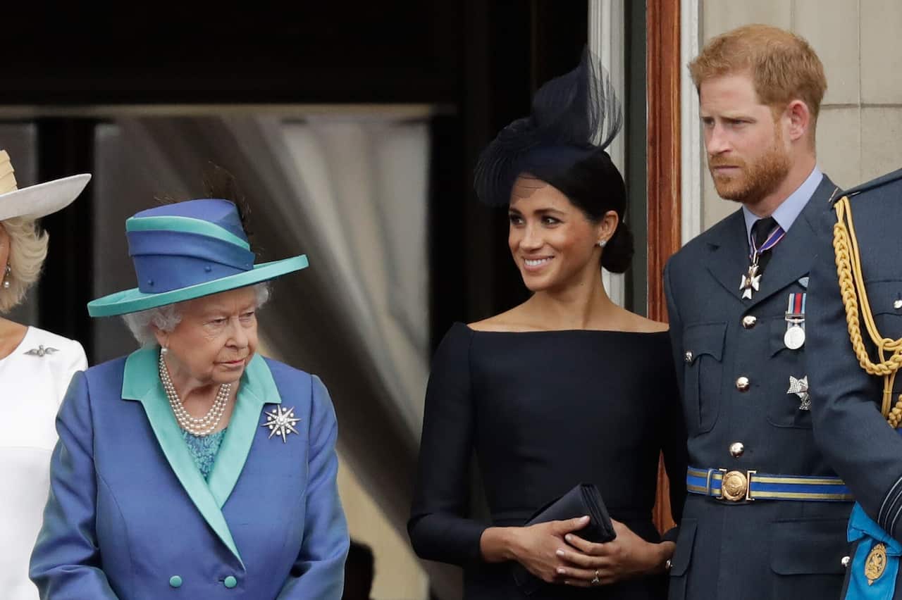 Queen Elizabeth II, Meghan the Duchess of Sussex and Prince Harry.