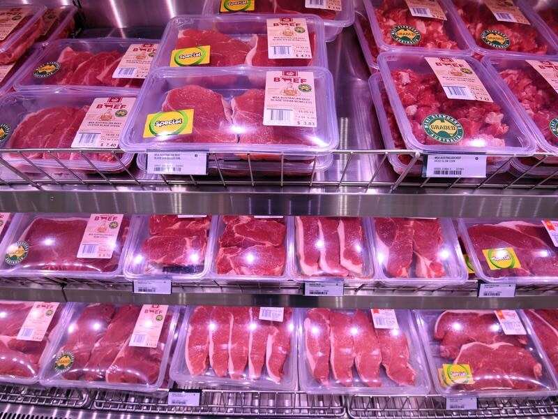 A stock image of meat on display at a supermarket.