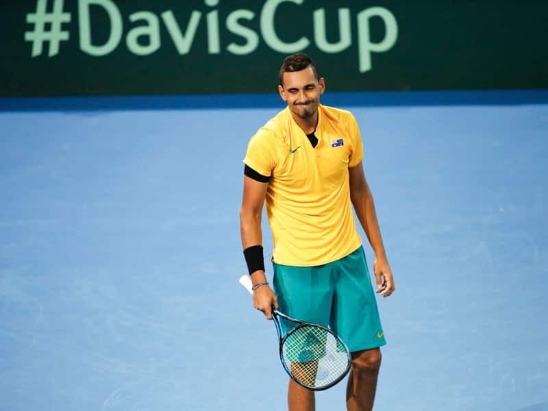 Nick Kyrgios of Australia in action against John Isner of the USA
