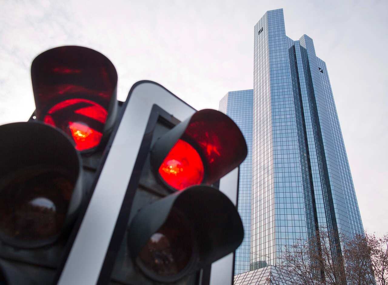 A file photo dated 13 December 2012 showing a red traffic light.