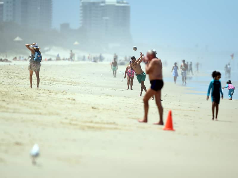 Beachgoers cool down at Surfers Paradise