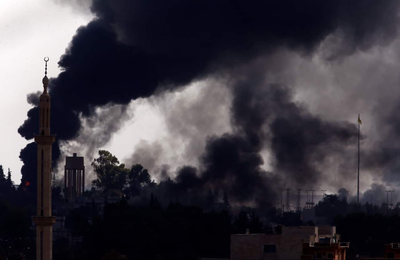 In this photo taken from the Turkish side of the border between Turkey and Syria, in Akcakale, Sanliurfa province, southeastern Turkey