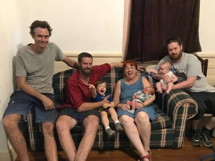 Fiona Wright (2nd from right) with her three sons and grandchildren.