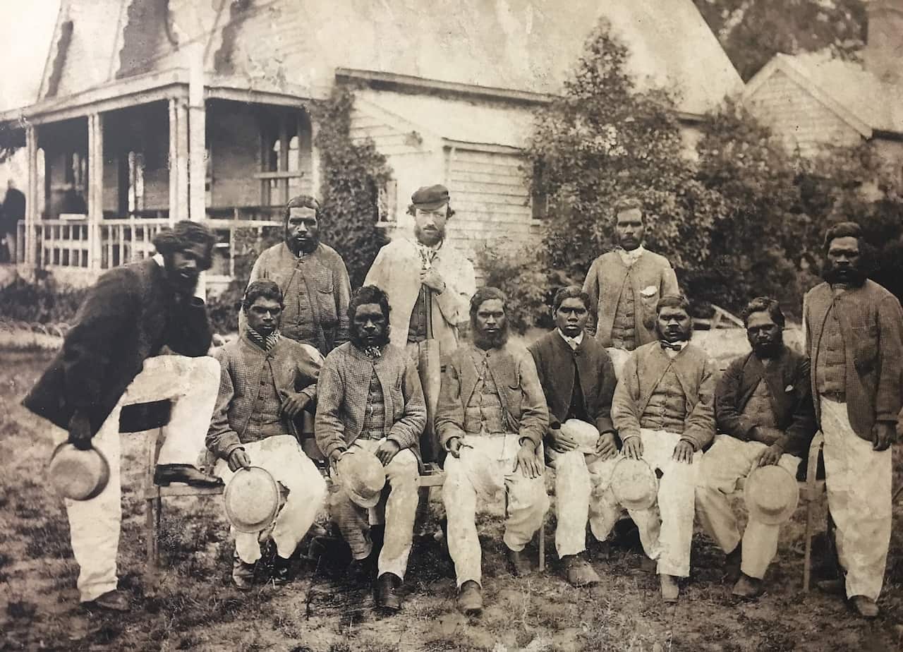 First XI 1866 MCC – In front of the original members pavilion at the Melbourne Cricket Ground (MCG) with Tom Wills, February 1867.