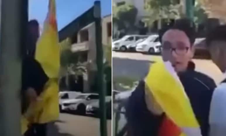 The screenshot of the man taking the flag.