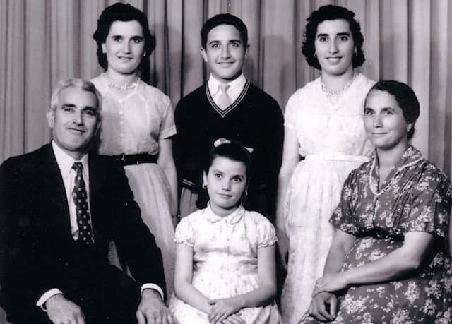 Franco Papandrea with his parents and three sisters in 1957.